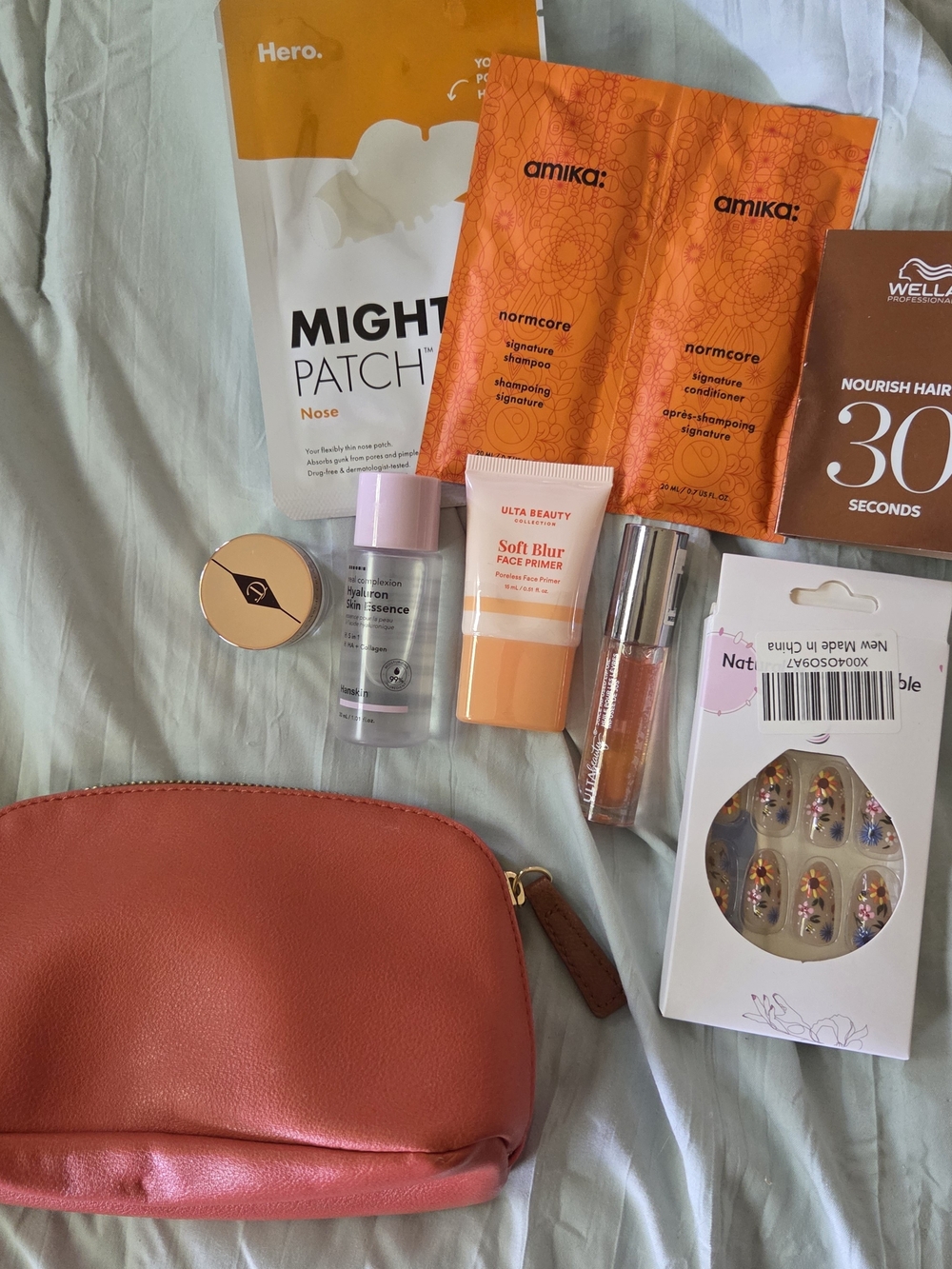 Coral Makeup Bag with Cosmetic Essentials